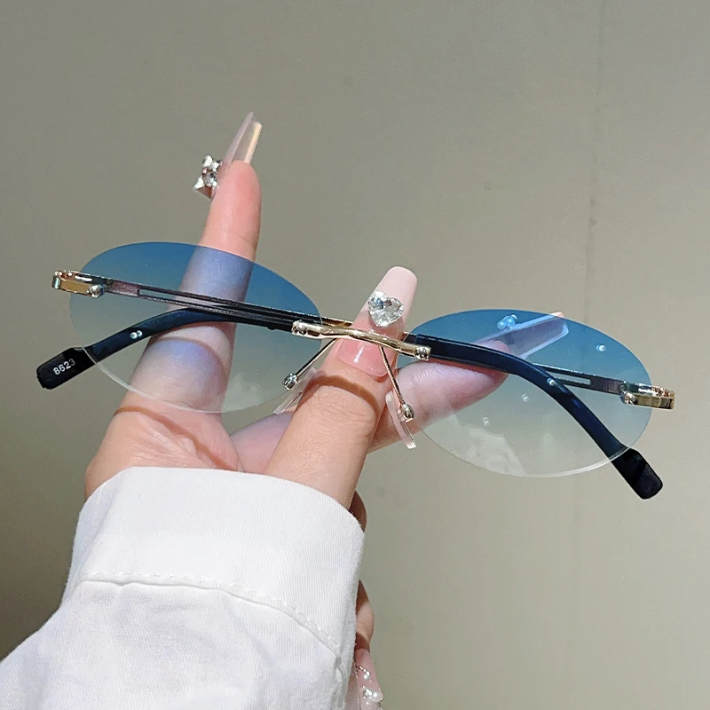 Rimless ovale zonnebrillen voo - Designer Sunglasses recensie en prijs